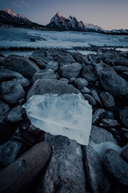 Ice over rocks in Abraham Lake, AB